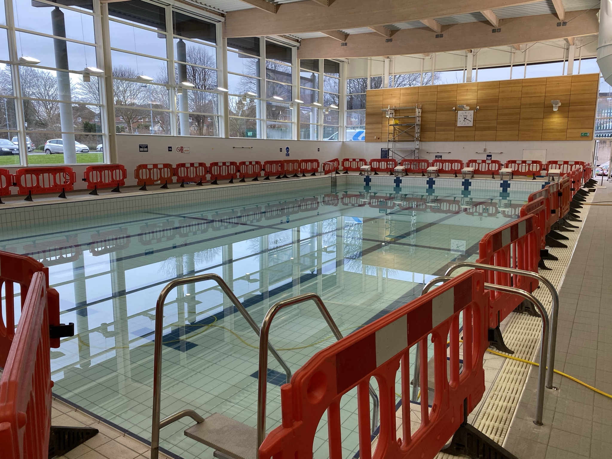 Swimming pool refurbishment works with safety barriers