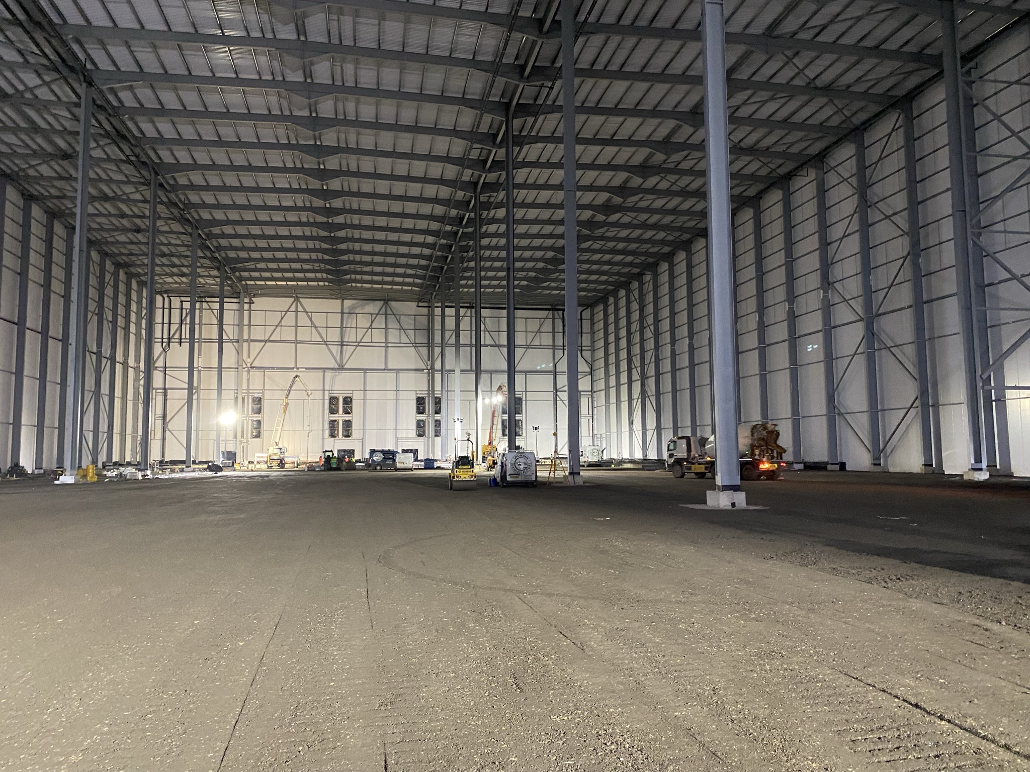 Large commercial warehouse interior under construction